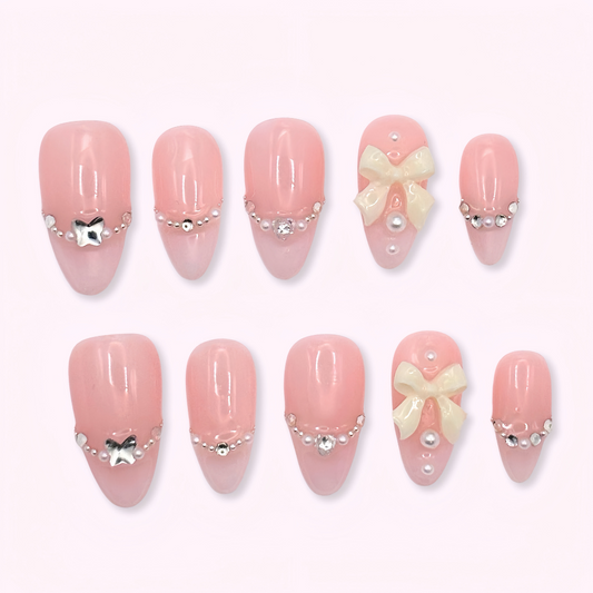 Pinkie Promise Nails Press-Ons Reusable Best Press-on Nails Salon Quality Nails at home Aalyah Medium Almond Press-On Nails, Set of pink nail art designs with bows pearls and jewels