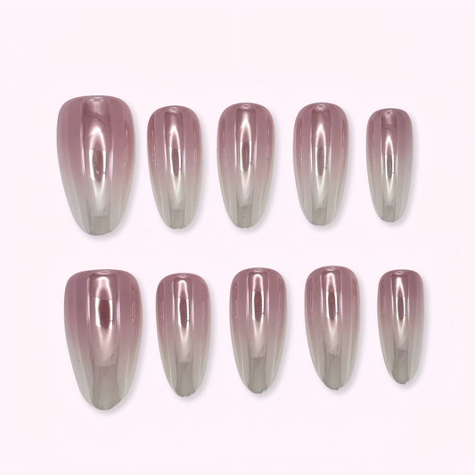 Pinkie Promise Nails Press-Ons Reusable Best Press-on Nails Salon Quality Nails at home Alani Long Oval Press-On Nails Set of pink and gray gradient nail extensions on a white background Chrome Nails