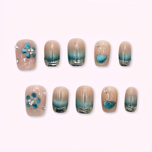 Pinkie Promise Nails Press-Ons Reusable Best Press-on Nails Salon Quality Nails at home Bleu Extra Short Squoval Press-On Nails, Set of nail art designs with beige, blue, and silver elements 