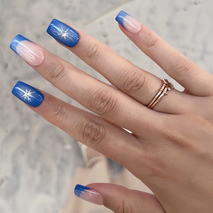 Pinkie Promise Nails Press-Ons Reusable Best Press-on Nails Salon Quality Nails at home Nova Medium Square Hand Image Build Your Kit Press-On Nails, Hand with blue and white gradient nails with stars