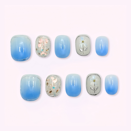 Pinkie Promise Nails Press-Ons Reusable Best Press-on Nails Salon Quality Nails at home Sky Extra Short Round Press-On Nails, Set of blue gradient nail designs with floral and geometric patterns